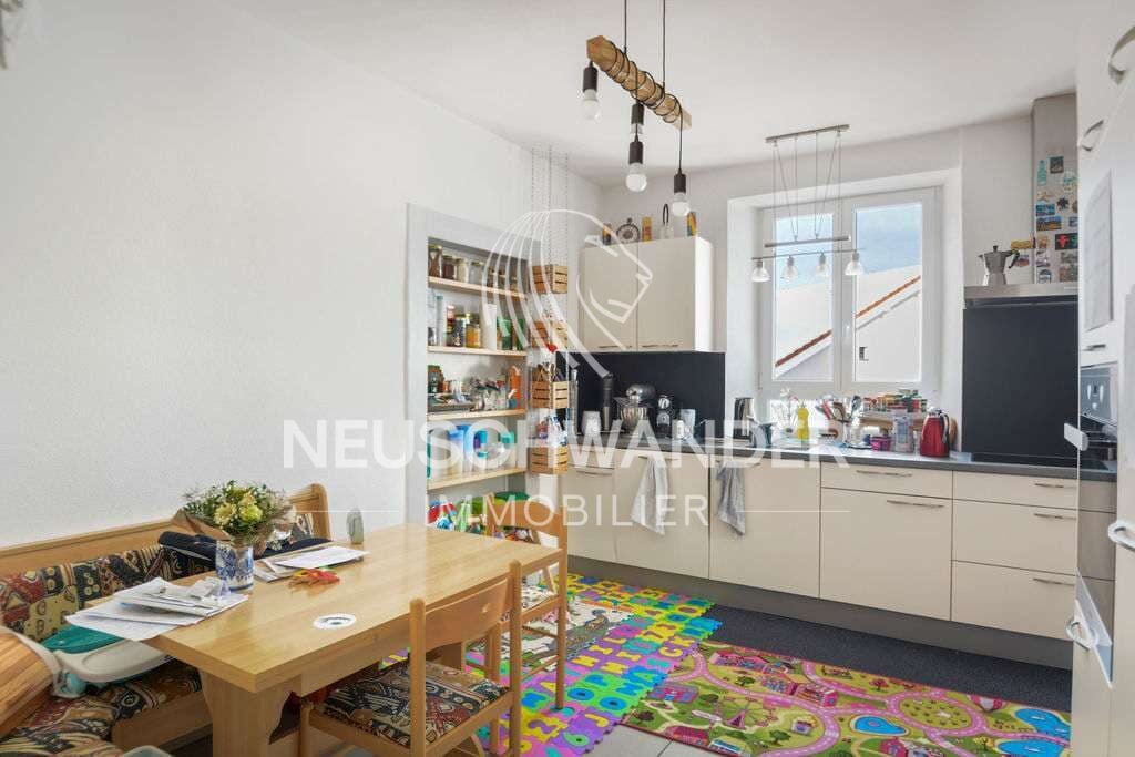 Immeuble de 4 logements et 3 commerces à vendre à Saignelégier - photo 5