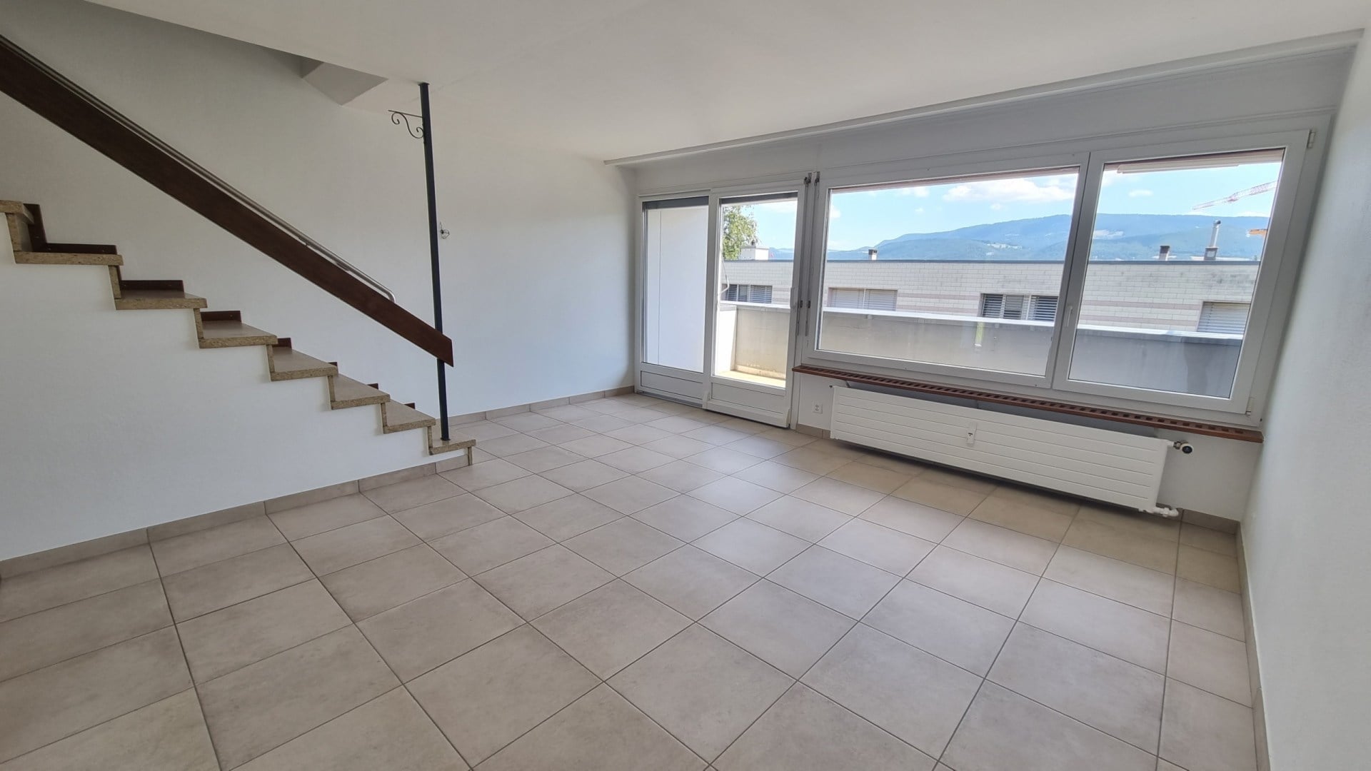 Maison en rangée de 4 pièces en duplex avec petit espace vert - photo 1