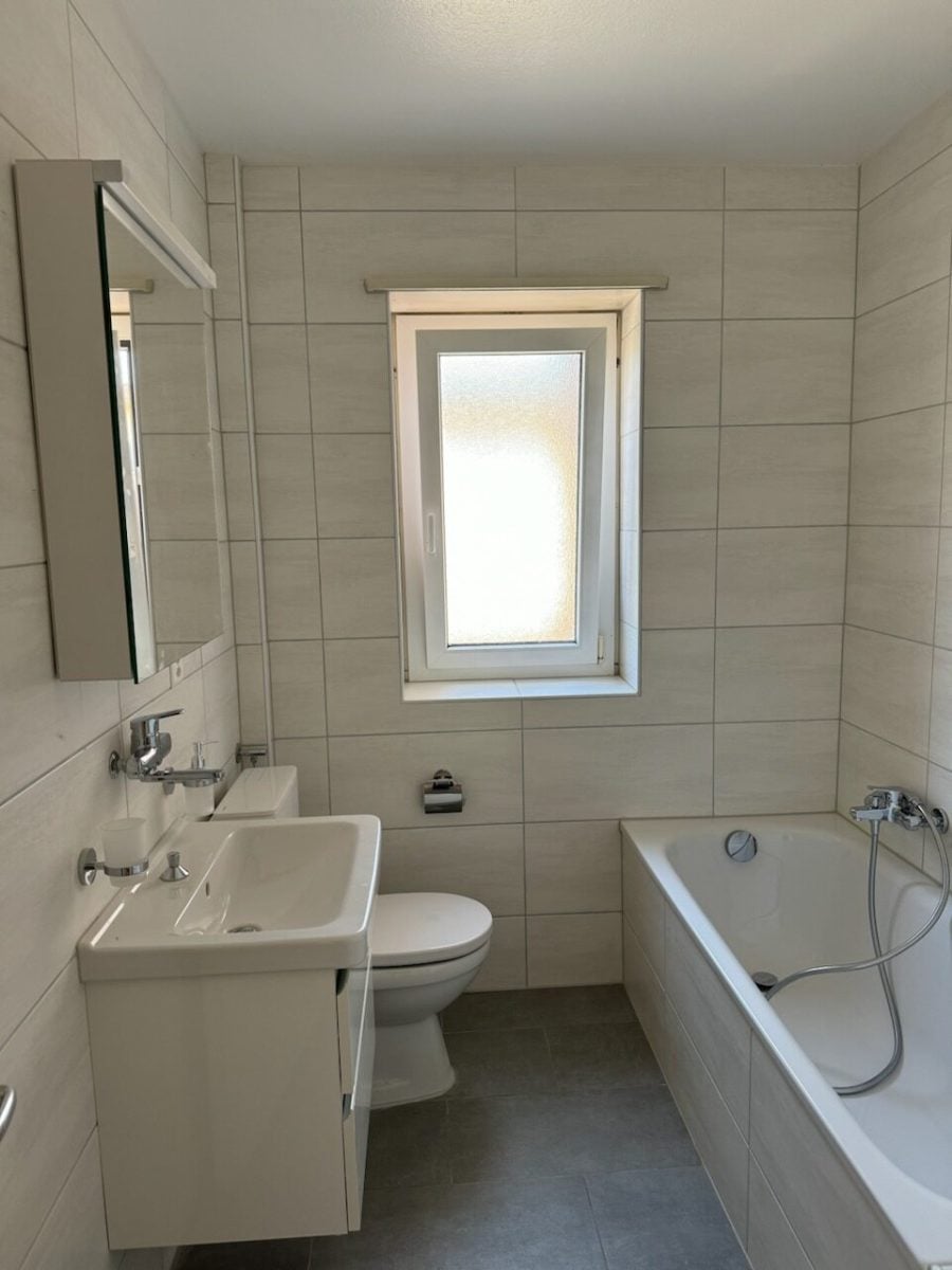Appartement de 3 pièces au 1er étage entièrement rénové - photo 3