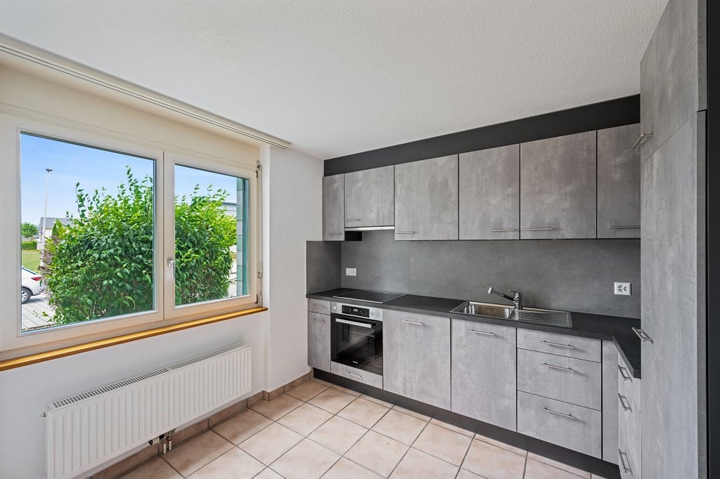 Appartement de 4 pièces au rez-de-chaussée avec balcon - photo 1