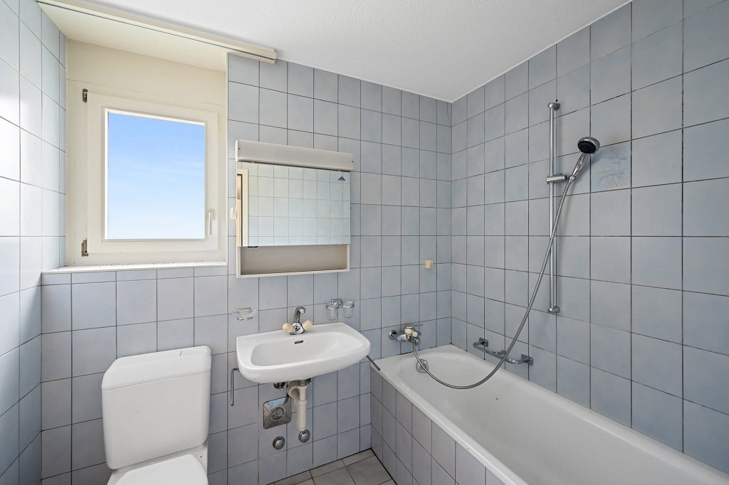 Appartement de 4 pièces au rez-de-chaussée avec balcon - photo 3