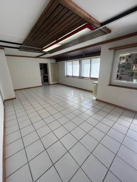 Studio de ~52 m2 au rez-de-chaussée à louer à Courtételle - photo 1