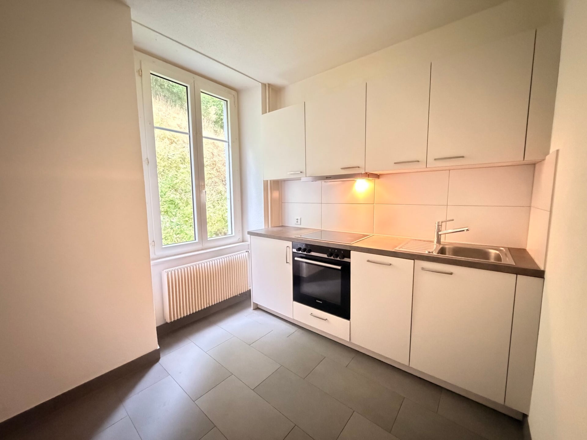 Appartement de 2,5 pièces au 1er étage à louer à Porrentruy - photo 1