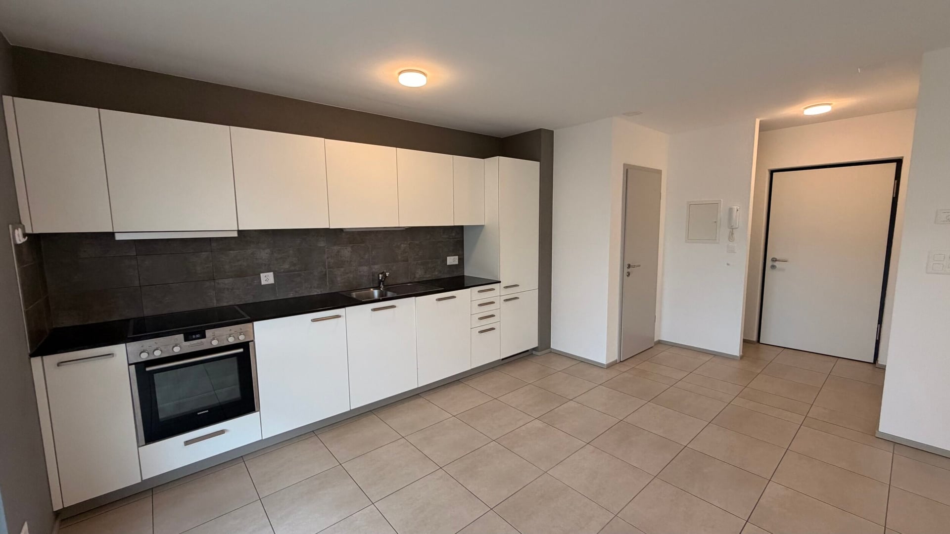 À louer à Courrendlin appartement à plain-pied de 3.5 pièces - photo 1