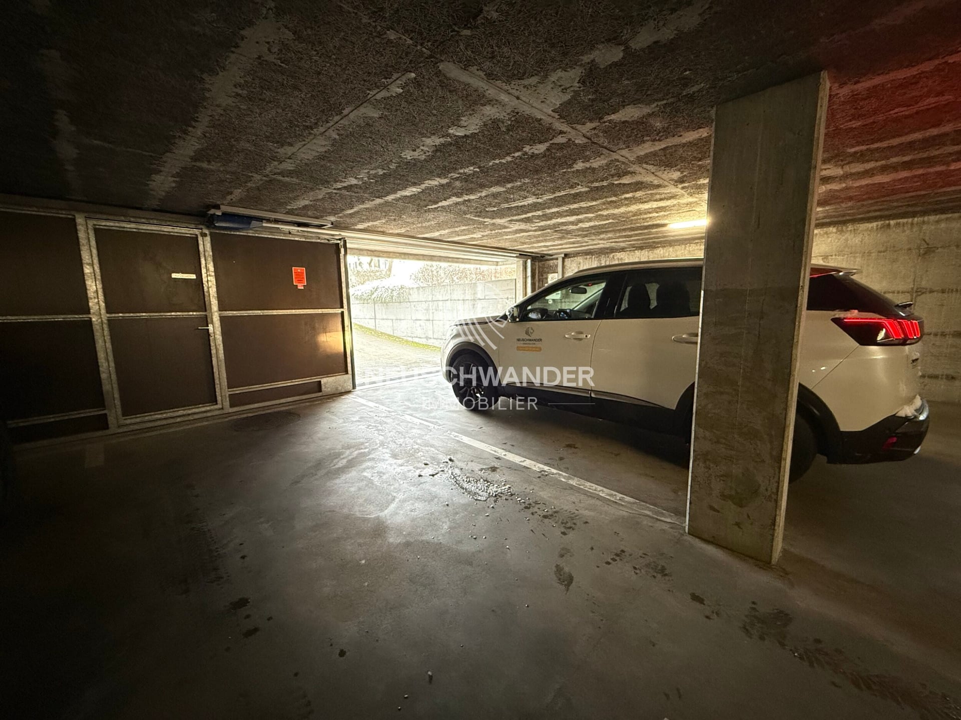 À vendre dans un parking souterrain 1 place de parc à Delémont - photo 4